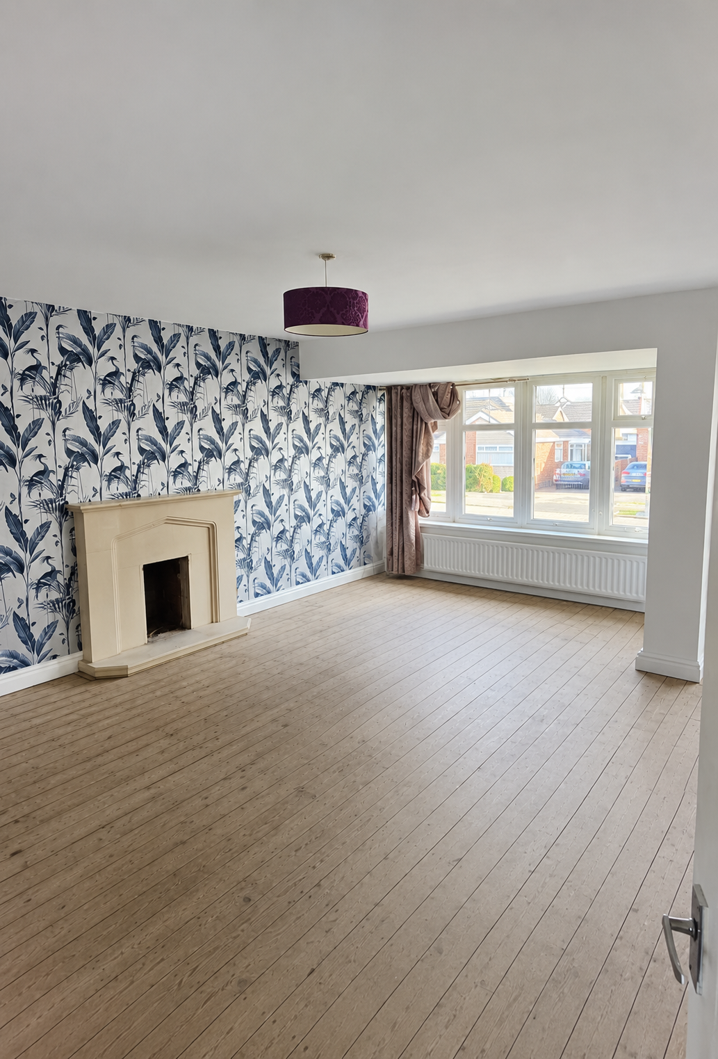 Professional wallpapering in Tameside, blue floral feature wall